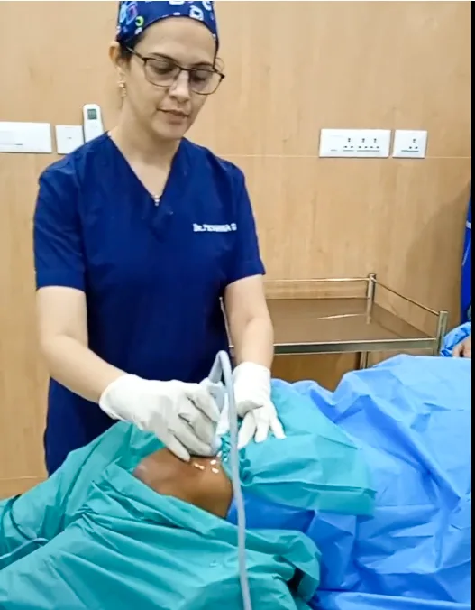 Doctor assessing knee movement during a clinical examination